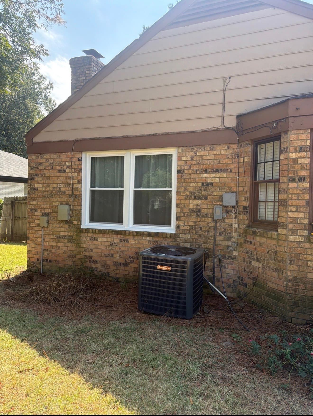 New white vinyl replacement windows finished in a Mid-South brick home